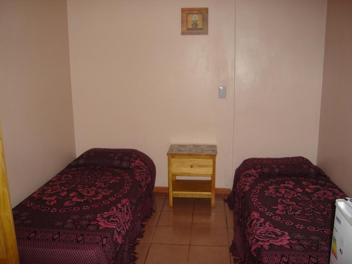 פוארטו איגואסו Apart Hotel Las Guayabas חדר תמונה